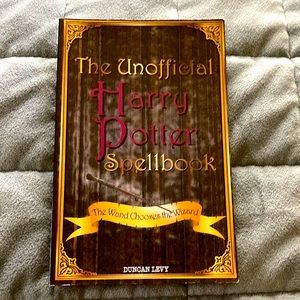 A Harry Potter book full of Charms Jinx’s and more. The book has 140 spells.